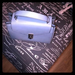 Small handled Light blue bag